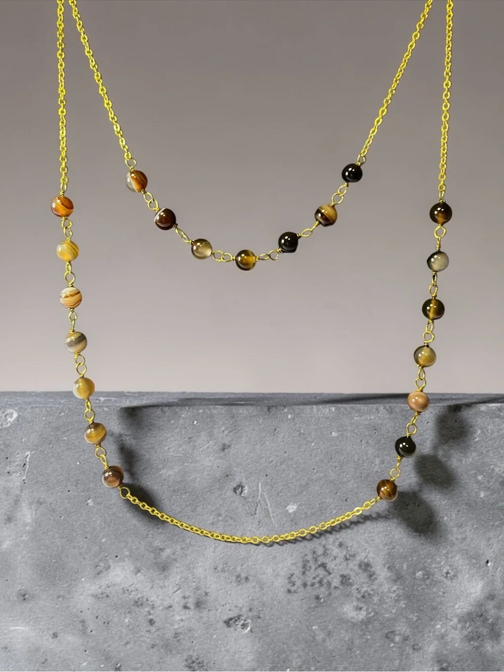 Gold Tone Layered Necklace with Brown and Tigereye Stones